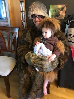 father and son dressed as chewbacca